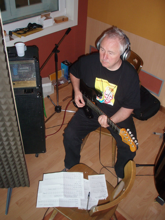 John Ellis playing guitar