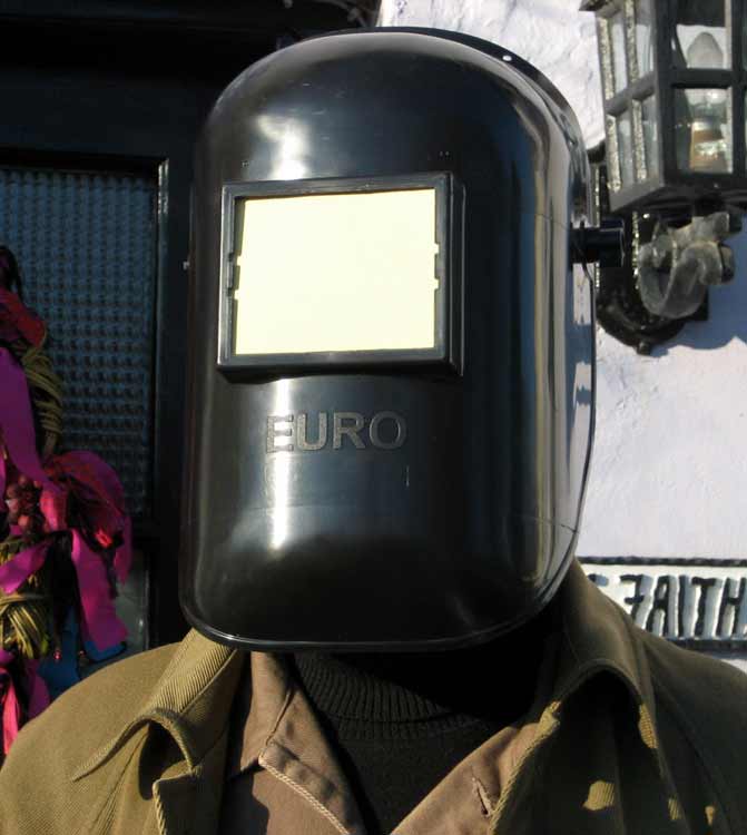 Judge, wearing a welder's mask